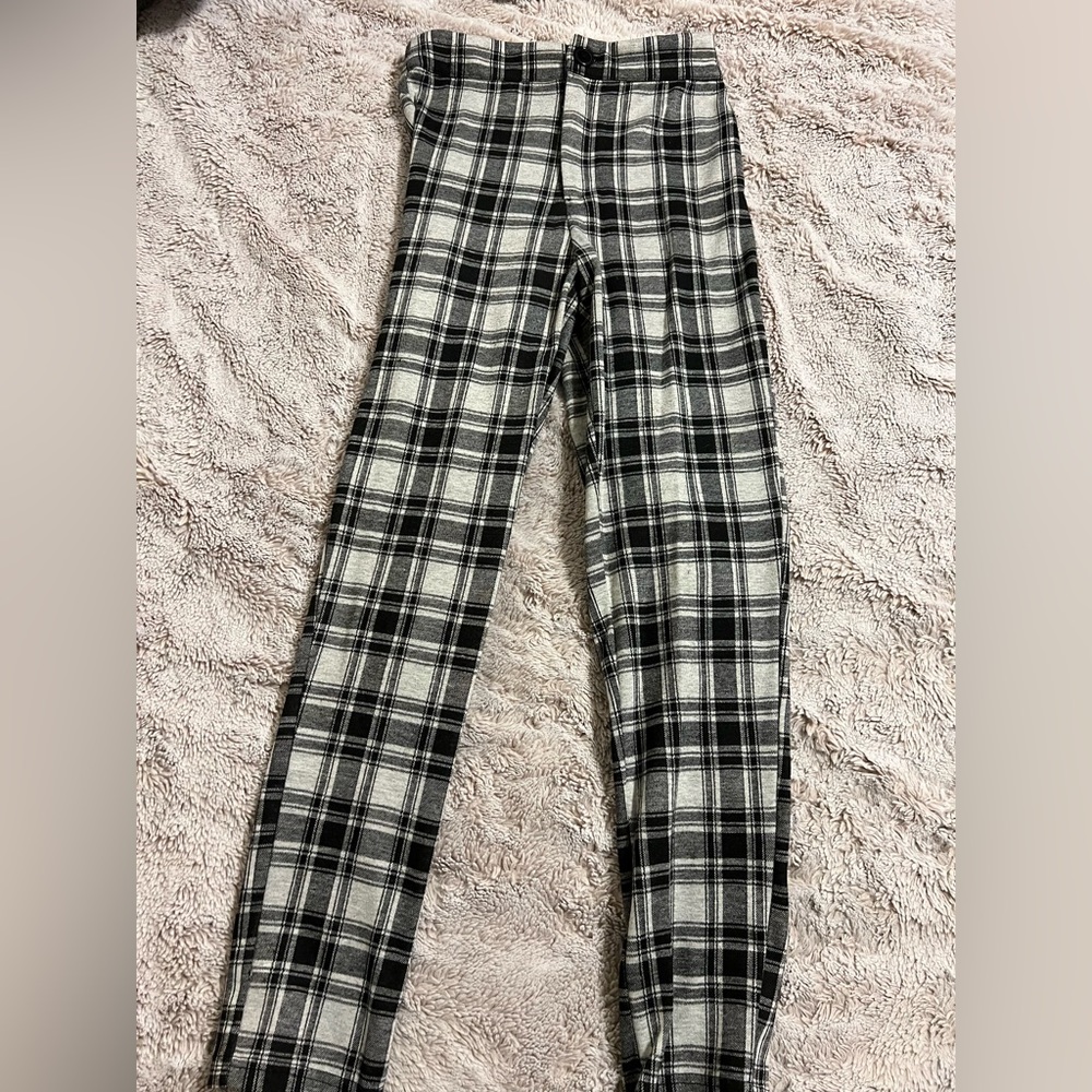 Super comfy and cute! Not quite leggings, they have a zipper and button